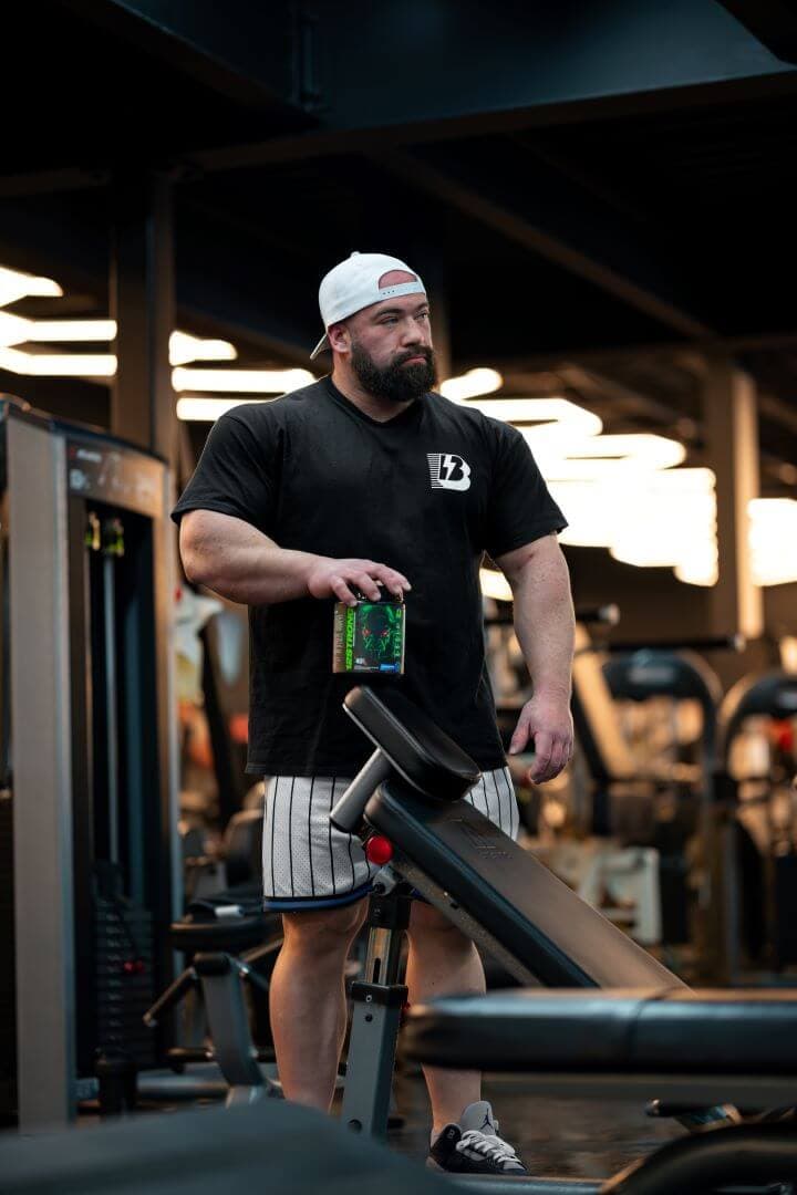 An athlete training with 12 STRONG pre-workout